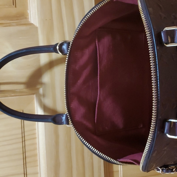 Coach Berry purse with gold accents. - Picture 4 of 7